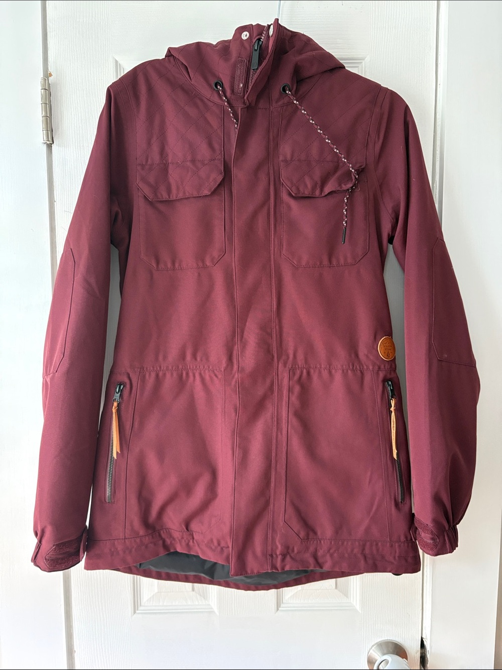 Volcom Waterproof Hooded snowboarding Jacket in Burgundy